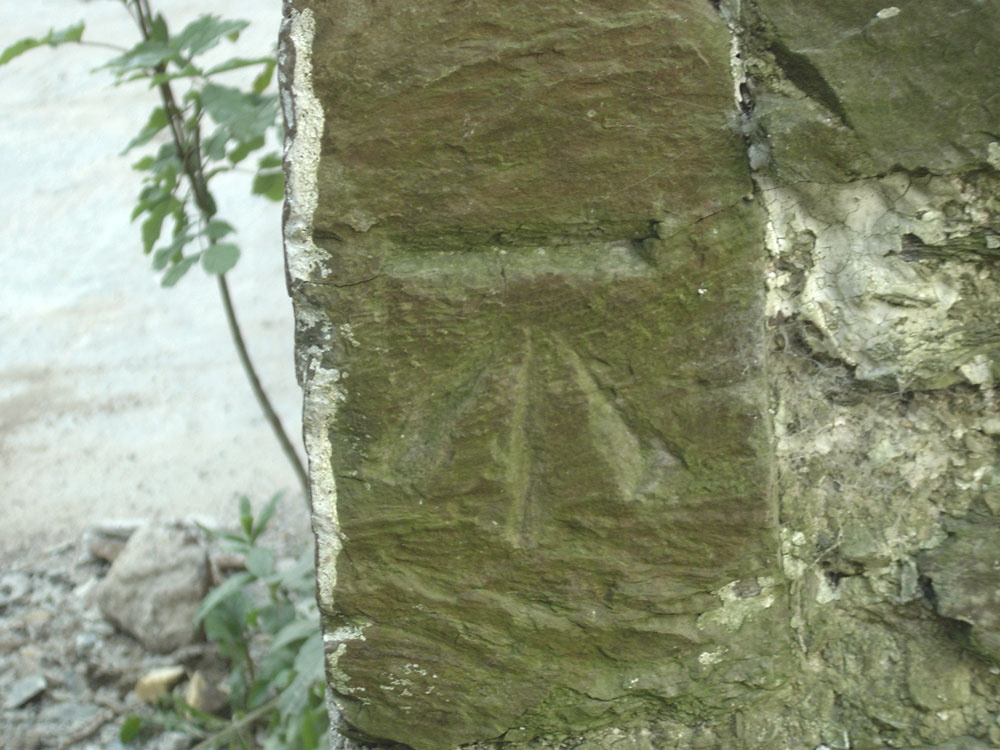 Ordnance Survey benchmark at Pistyll Gwyn, Talog